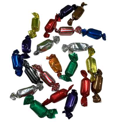 Assorted Meltaway Chocolates scattered about to show product on white background.