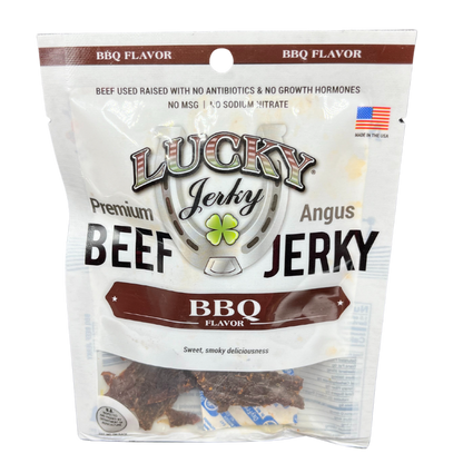 A package of Lucky Premium Jerky, Angus Beef, BBQ Flavor, with a claim of no antibiotics, no growth hormones, and no MSG. The package is white with product images and branding details.