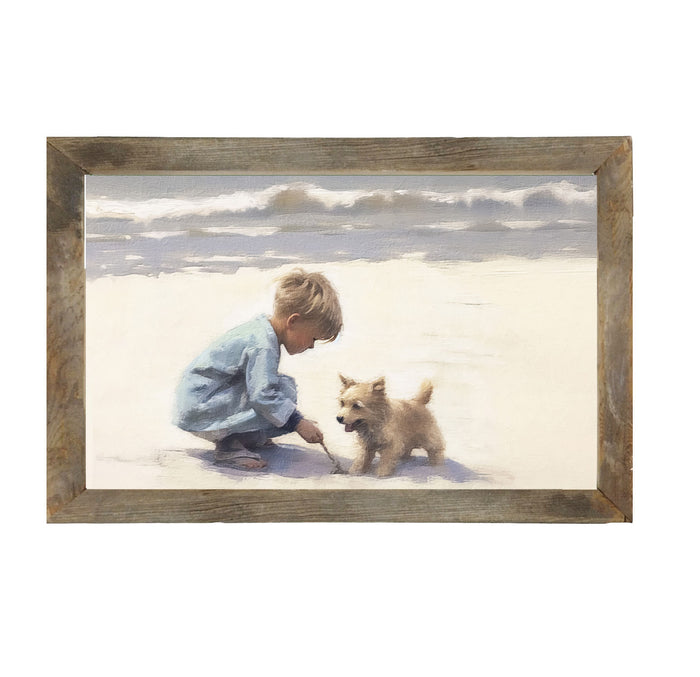 Boy with dog on beach