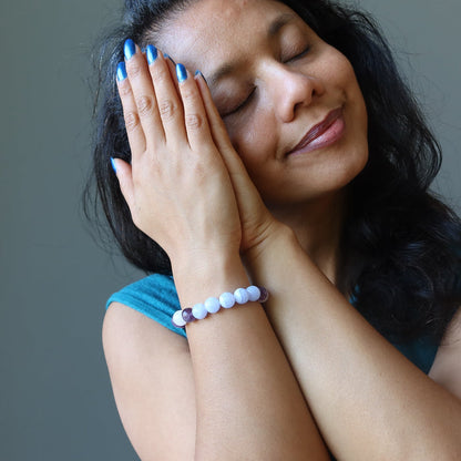 sheila of satin crystals wearing blue lace agate, rose quartz, amethyst stretch bracelet for sleep