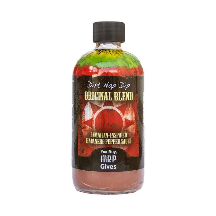 Bottle of Jamaican-inspired habanero pepper sauce with colorful label on a white background