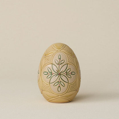 Handcrafted ceramic egg by Rookwood Pottery
