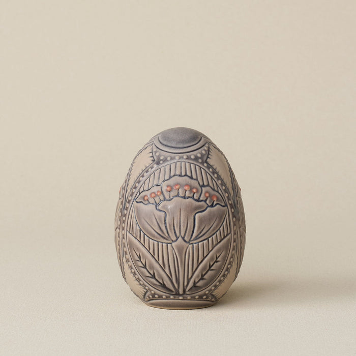 Handcrafted ceramic egg by Rookwood Pottery