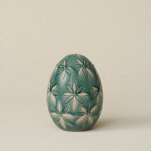 Handcrafted ceramic egg by Rookwood Pottery