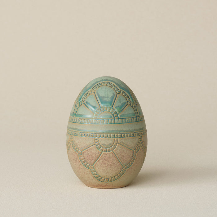Handcrafted ceramic egg by Rookwood Pottery