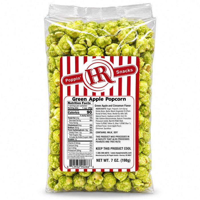 A 7 oz bag of green apple popcorn with a red and white striped label, photographed on a clean white background.