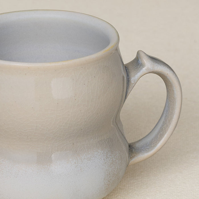 Close-up details of hand-thrown mug by Rookwood