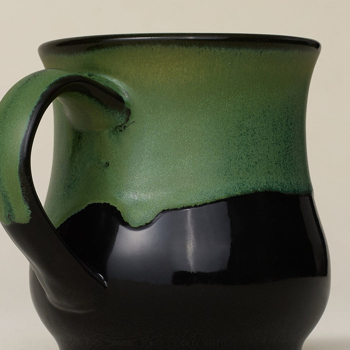 Close-up details of hand-thrown mug by Rookwood