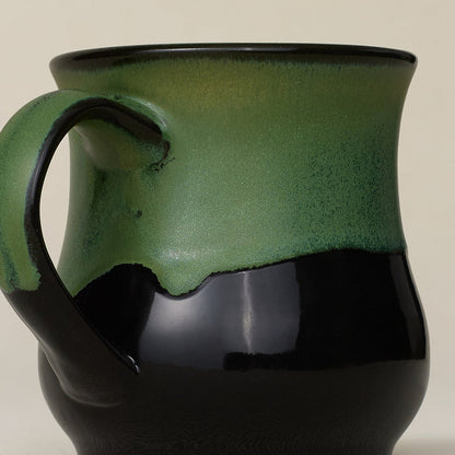 Close-up details of hand-thrown mug by Rookwood