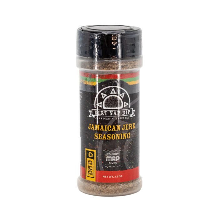 A bottle of Jamaican Jerk Seasoning by Mystic Rhoads Productions, 3.2 oz size, with a black cap and label featuring red and yellow stripes.