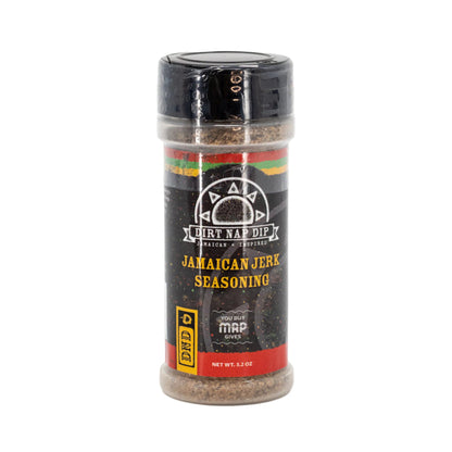 A bottle of Jamaican Jerk Seasoning by Mystic Rhoads Productions, 3.2 oz size, with a black cap and label featuring red and yellow stripes.