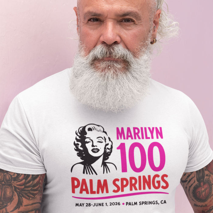 Man wearing a white t-shirt with Marilyn Monroe graphic and text about Palm Springs event.