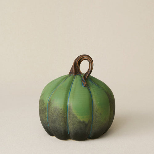 Hand-thrown and hand-glazed ceramic pumpkin by Rookwood Pottery
