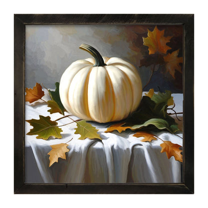 White pumpkin on table cloth