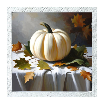 White pumpkin on table cloth