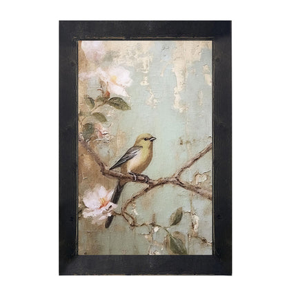 Yellow bird on branch